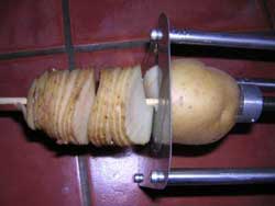 Chip being cut in potato cutter